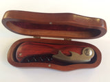 wine opener , rosewood and stainless, with velvet lined hinged box