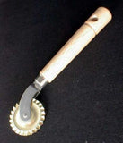 pasta & pastry cutter, brass plated, fluted-edged blade